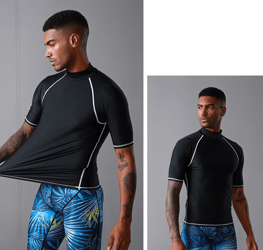 Man wearing Sports Elastic Beach T-shirt for water sports, showcasing stretch and fit, with blue printed shorts. Ideal for diving and surfing.